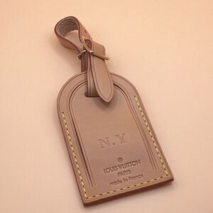 ❤️authentic lv tag  with NY initials only flaw.